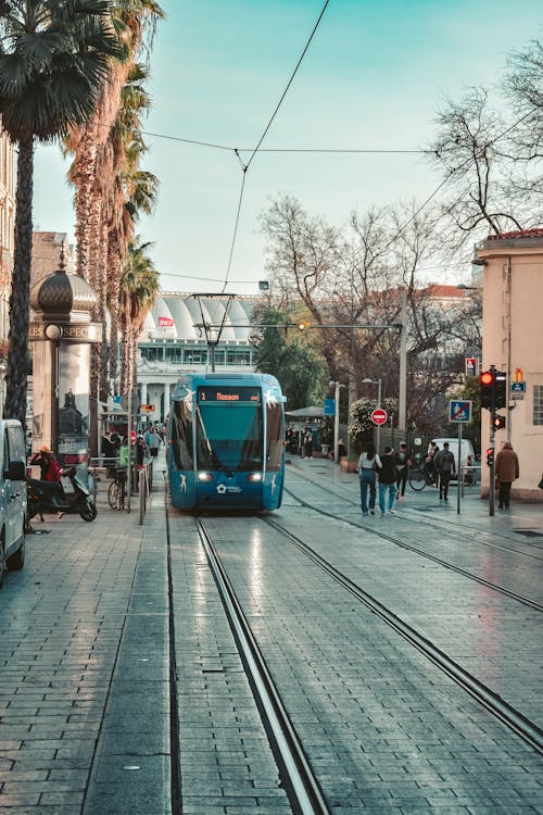 Blue Tram on the Street