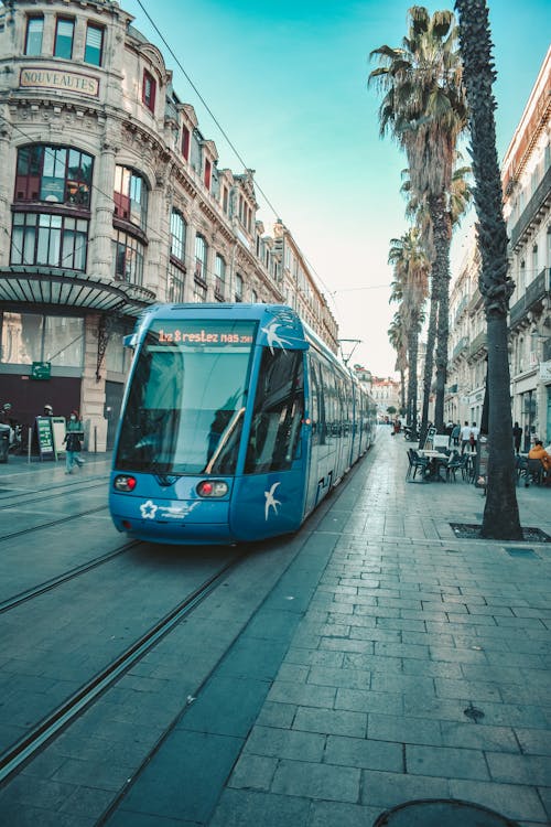 Blue Tram on the Street