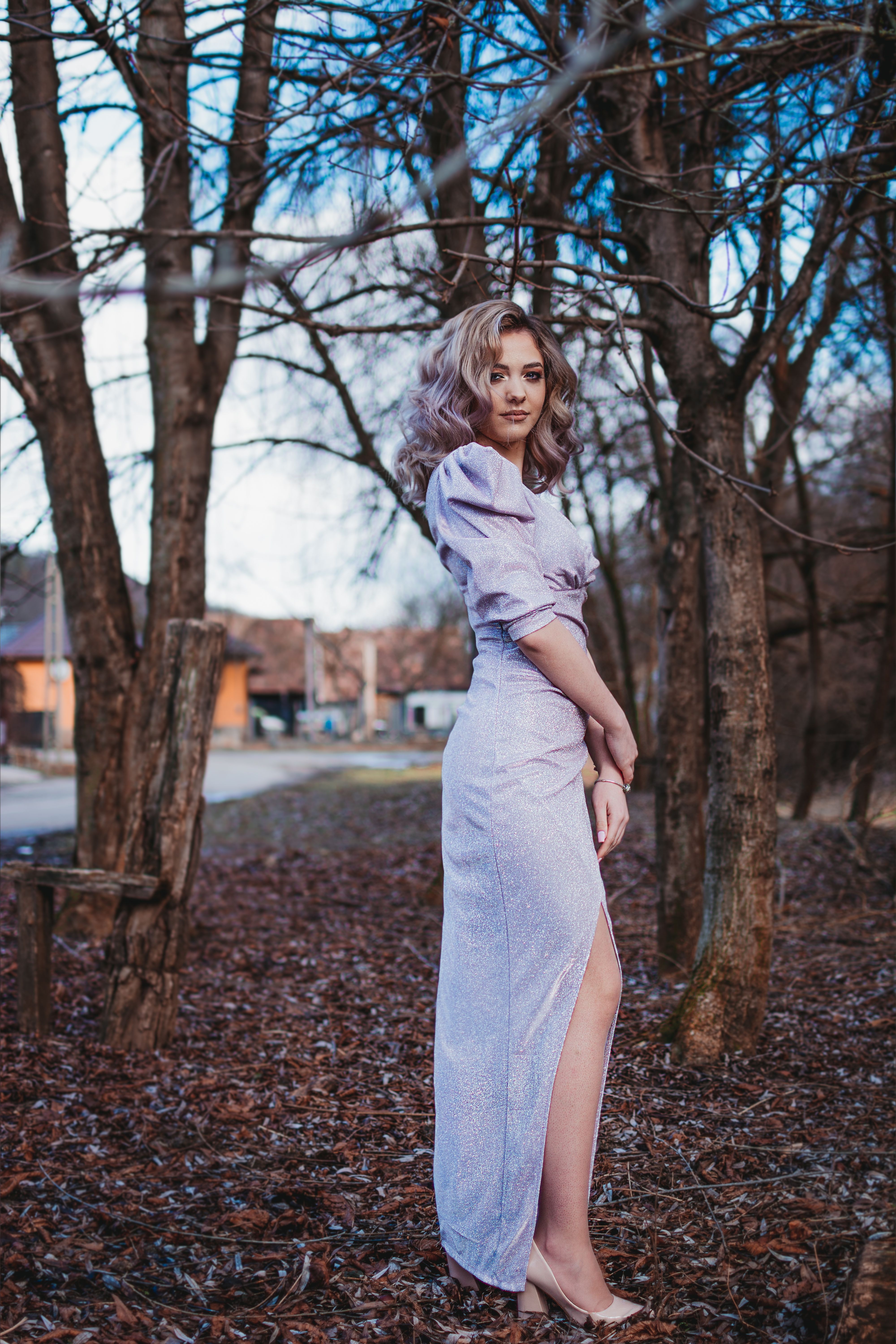 Woman in a Dress Posing Among Trees · Free Stock Photo