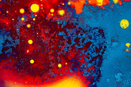 A vibrant abstract artwork with bold colors resembling a cosmic pattern, filled with dynamic textures.