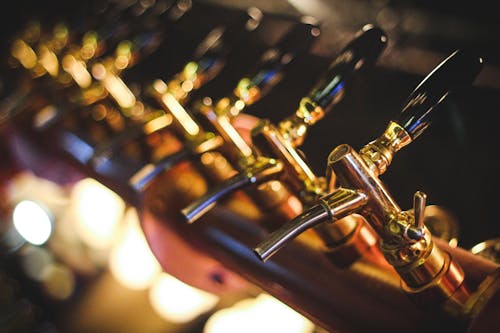 Golden Beer Taps in Close Up Shot