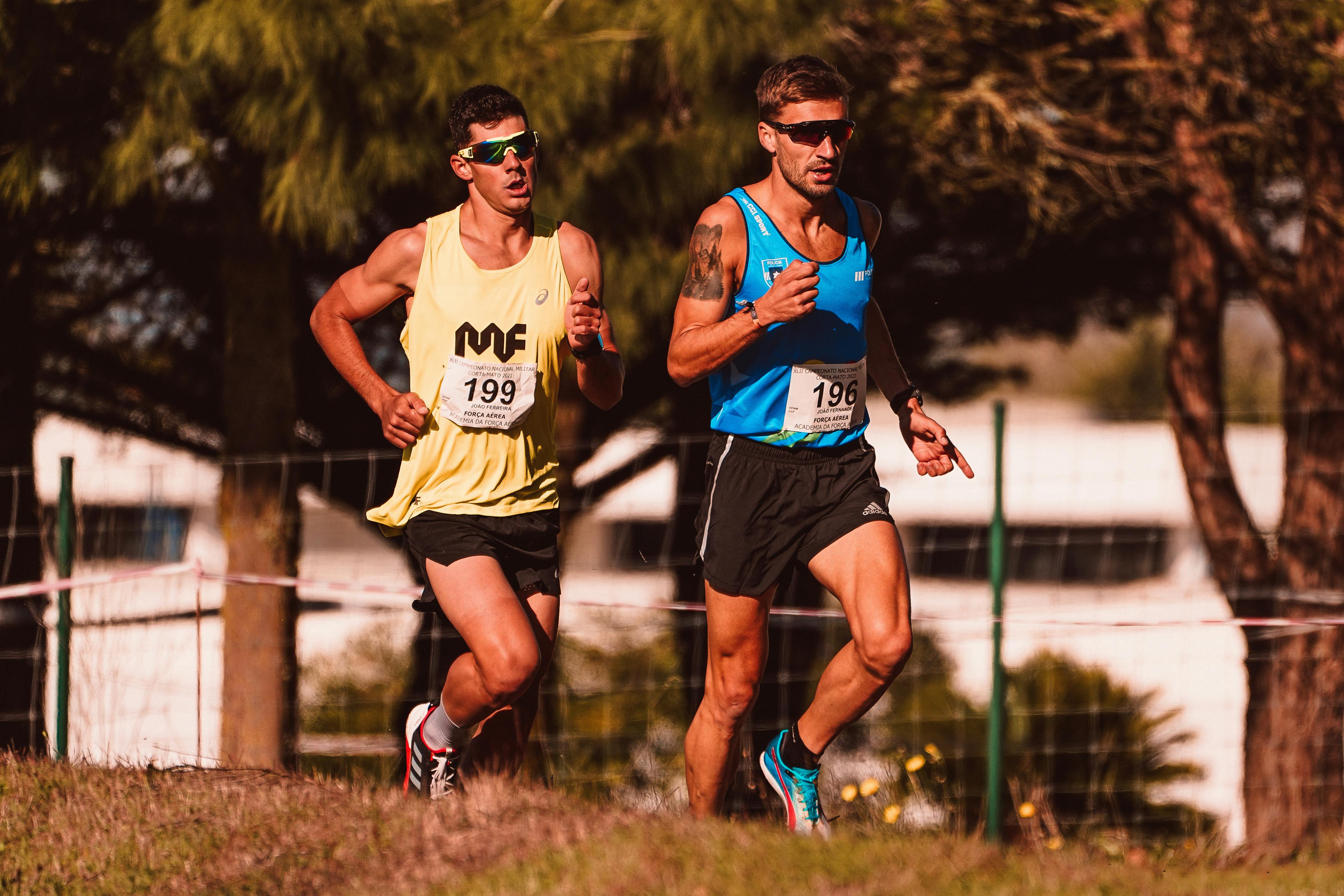 Men Wearing Sunglasses while Running on the Field · Free Stock Photo