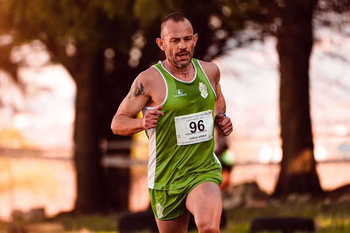 Runner in performance sportswear moving outdoors