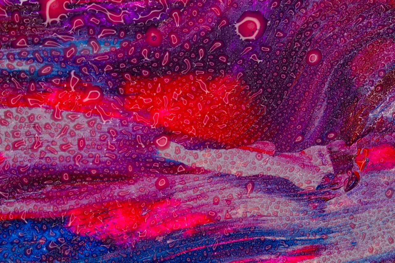 colorful abstract art with vivid shades of red purple and blue texture