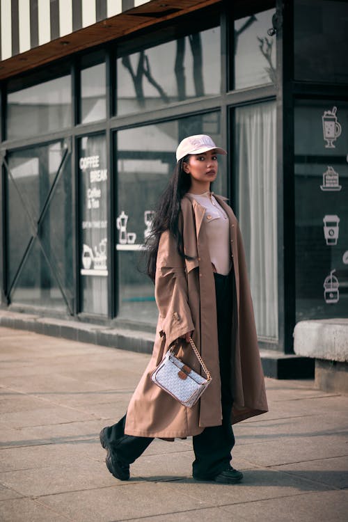 Beautiful Woman Wearing a Brown Coat 