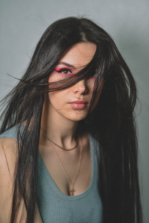 Portrait of a Beautiful Woman with Long Black Hair