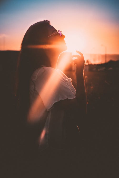 Free Woman Wearing White Top and Gray Framed Sunglasses Stock Photo