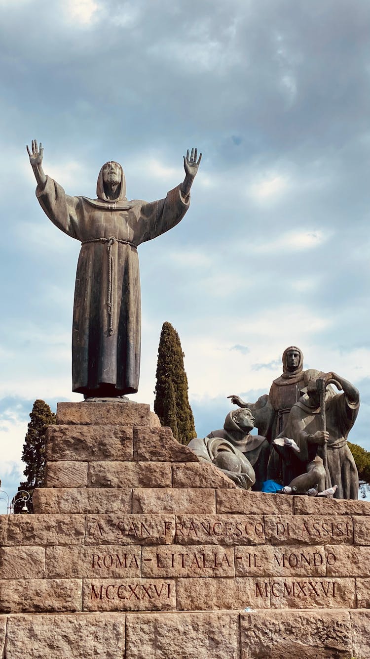 Stone Monument With Saint Francis Of Assisi Statue