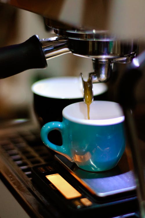 Free Espresso Maker Filling Cups Stock Photo