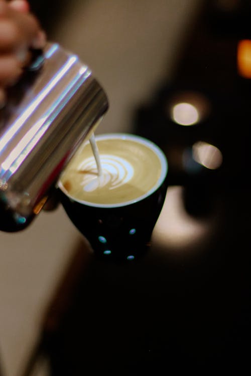 Close-up Photography of Latte Art Making