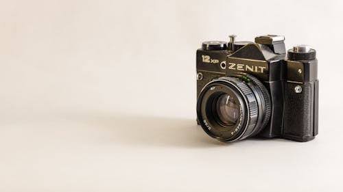 Black and Silver Camera in Close Up Shot