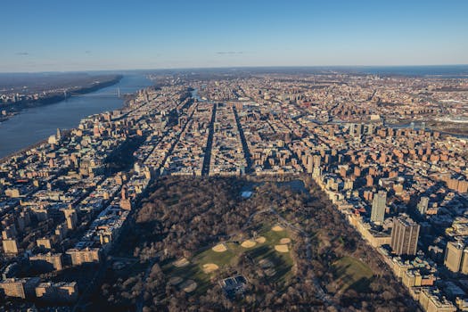Stunning aerial view of Central Park surrounded by the Manhattan skyline in New York City.