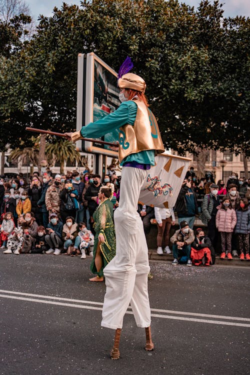 Free People Watching a Performer on a Parade Stock Photo