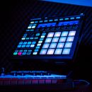 Maschine and piano with blue neon light in a recording studio