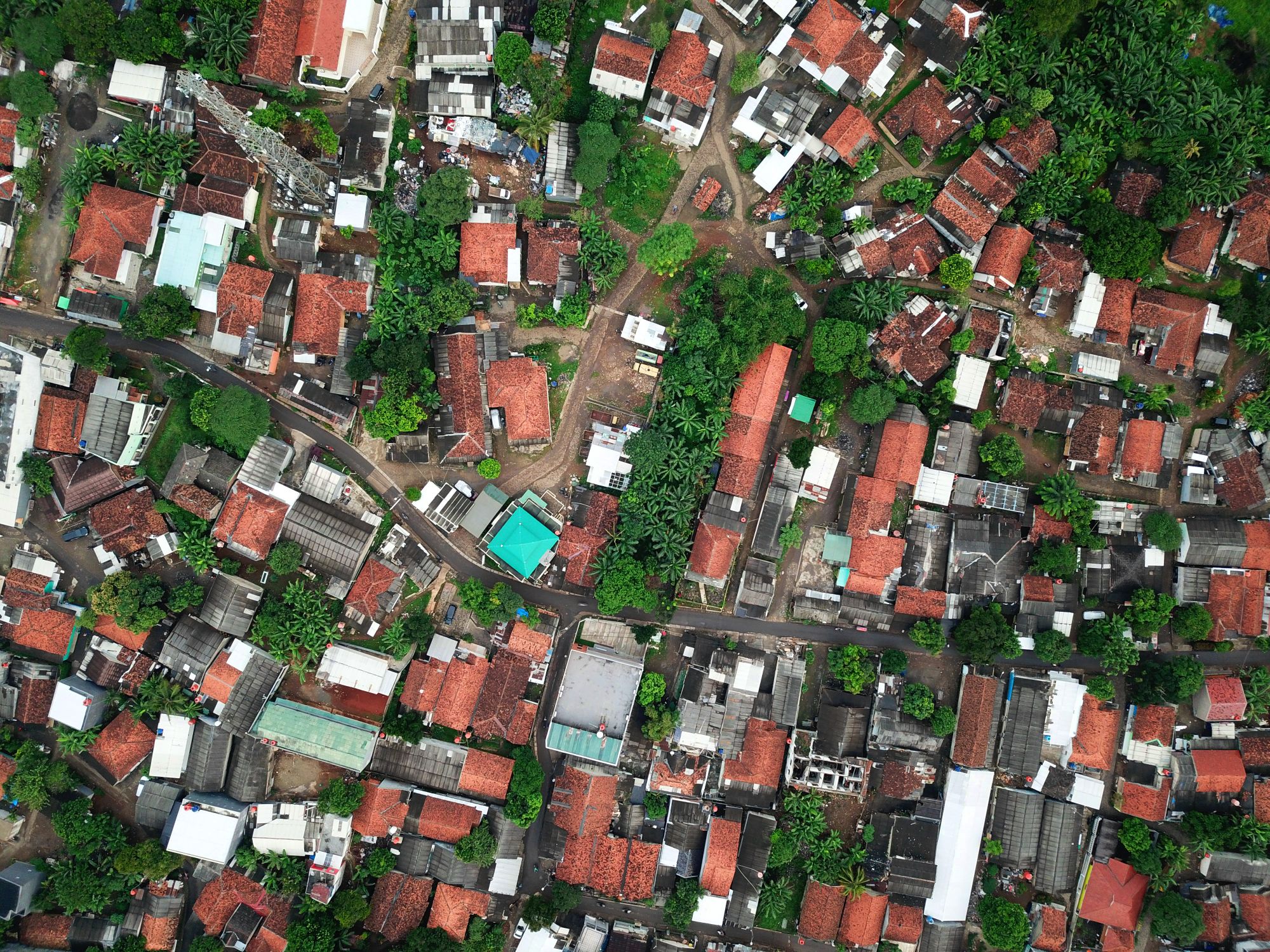 Aerial view of homes and greenery in Serpong, Indonesia, showcasing urban architecture.