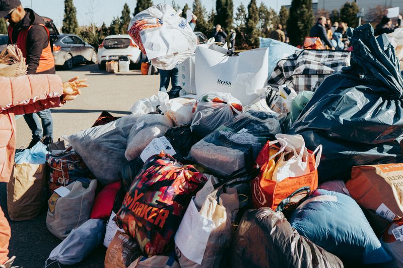 A busy street donation event in Vilnius, showcasing community contribution and care.