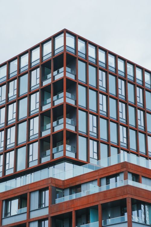 Free Contemporary architecture of a modern residential building with glass and metal facade. Stock Photo