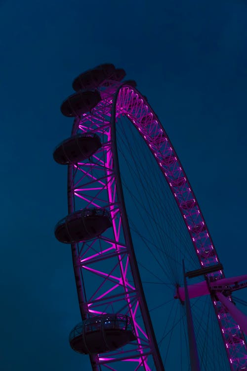 Free Rotating Ferris Wheel with Purple Lights Stock Photo