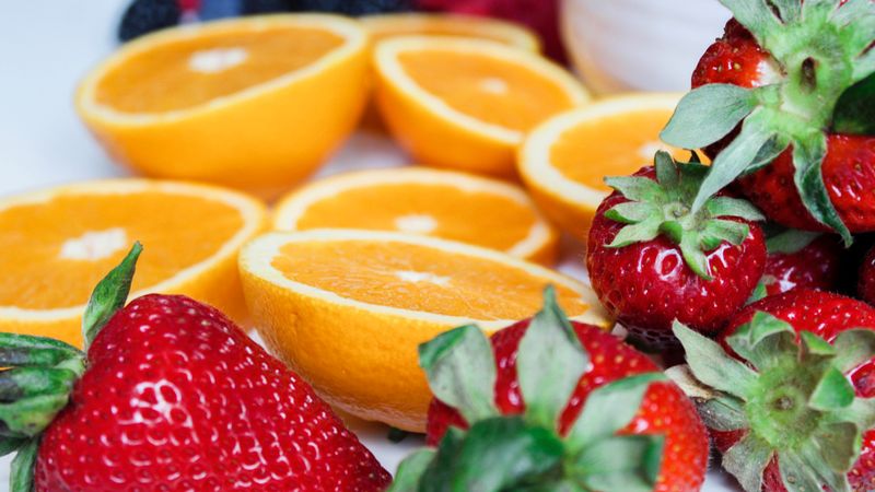 Fresh sliced fruit on a bright kitchen counter