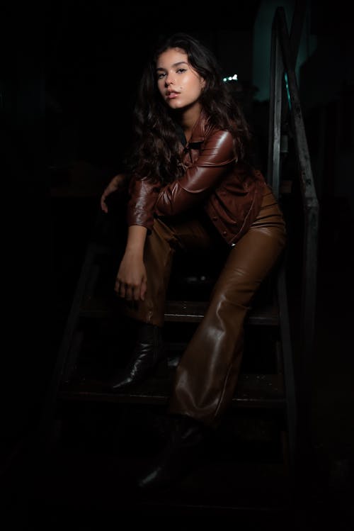 Woman in Brown Leather Clothing