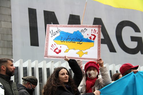 Woman Holding a Placard