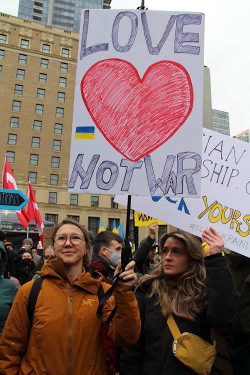 Free Young Women in the Streets of Canada Showing Support for Ukraine  Stock Photo