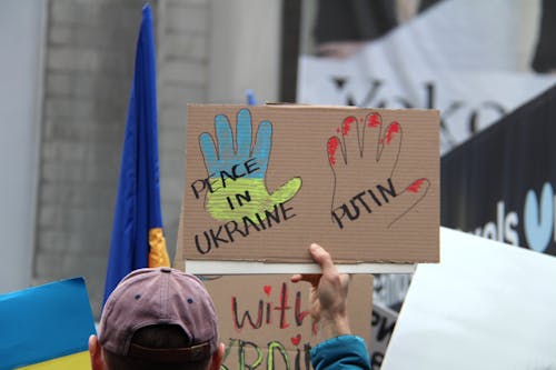 A Person Holding a Poster