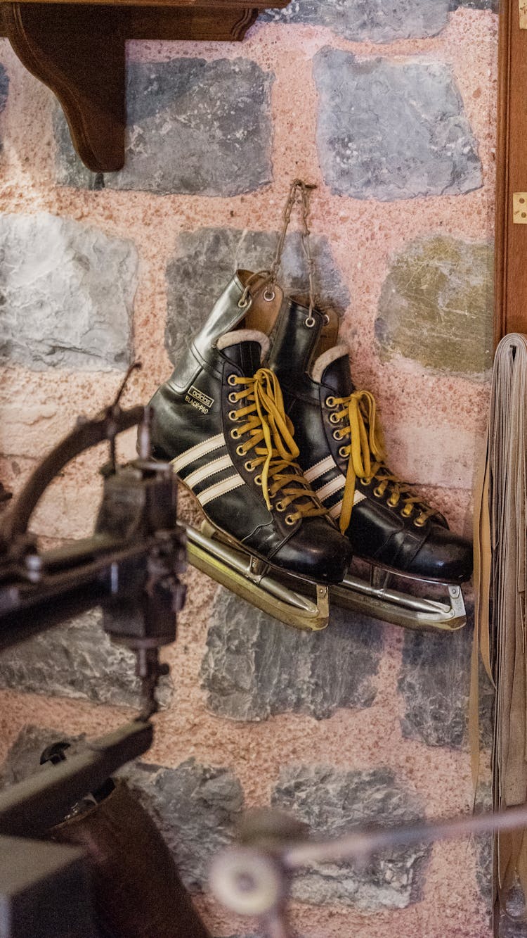 Adidas Ice Skates Hanging On The Wall 