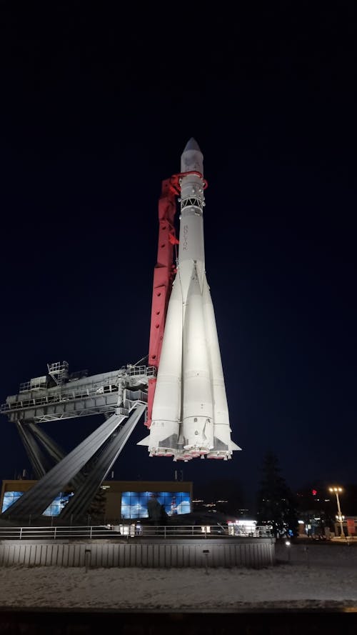 Vostok Rocket on Display at Night Time