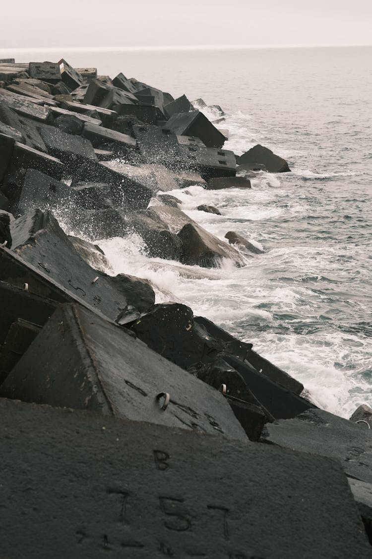 Asphalt Blocks On Sea Shore