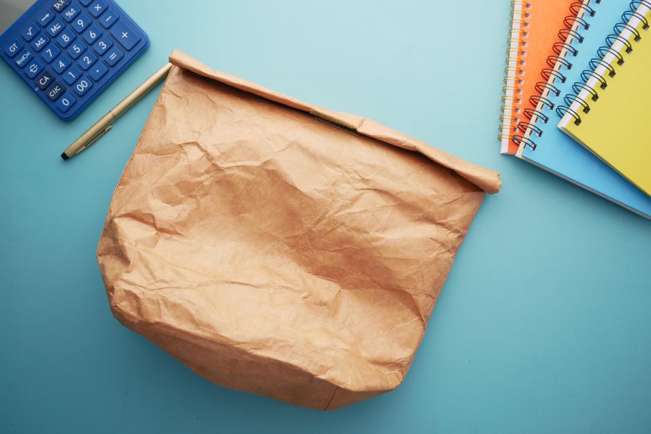 bag and notebook by the door natural light lifestyle photo 1
