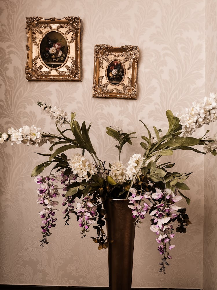 Lilac Flowers In A Vase And Golden Frames On Vintage Wallpaper