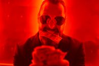 Man in Black Sunglasses Holding 10 Us Dollar Bill