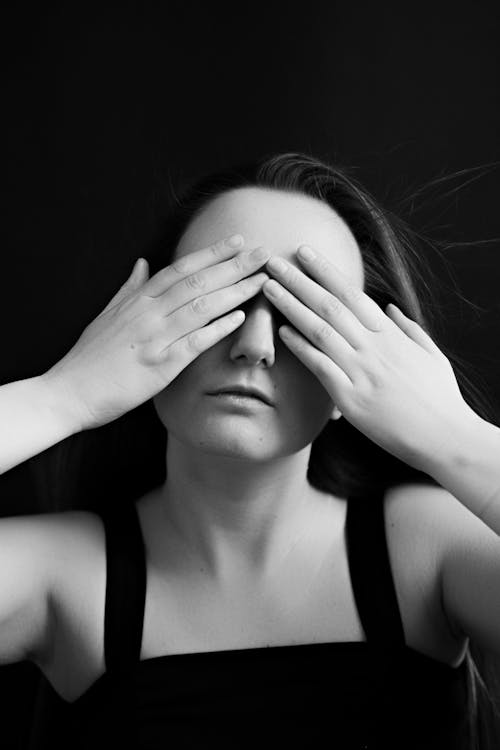 Free Adult Woman Covering Eyes with Hands Stock Photo