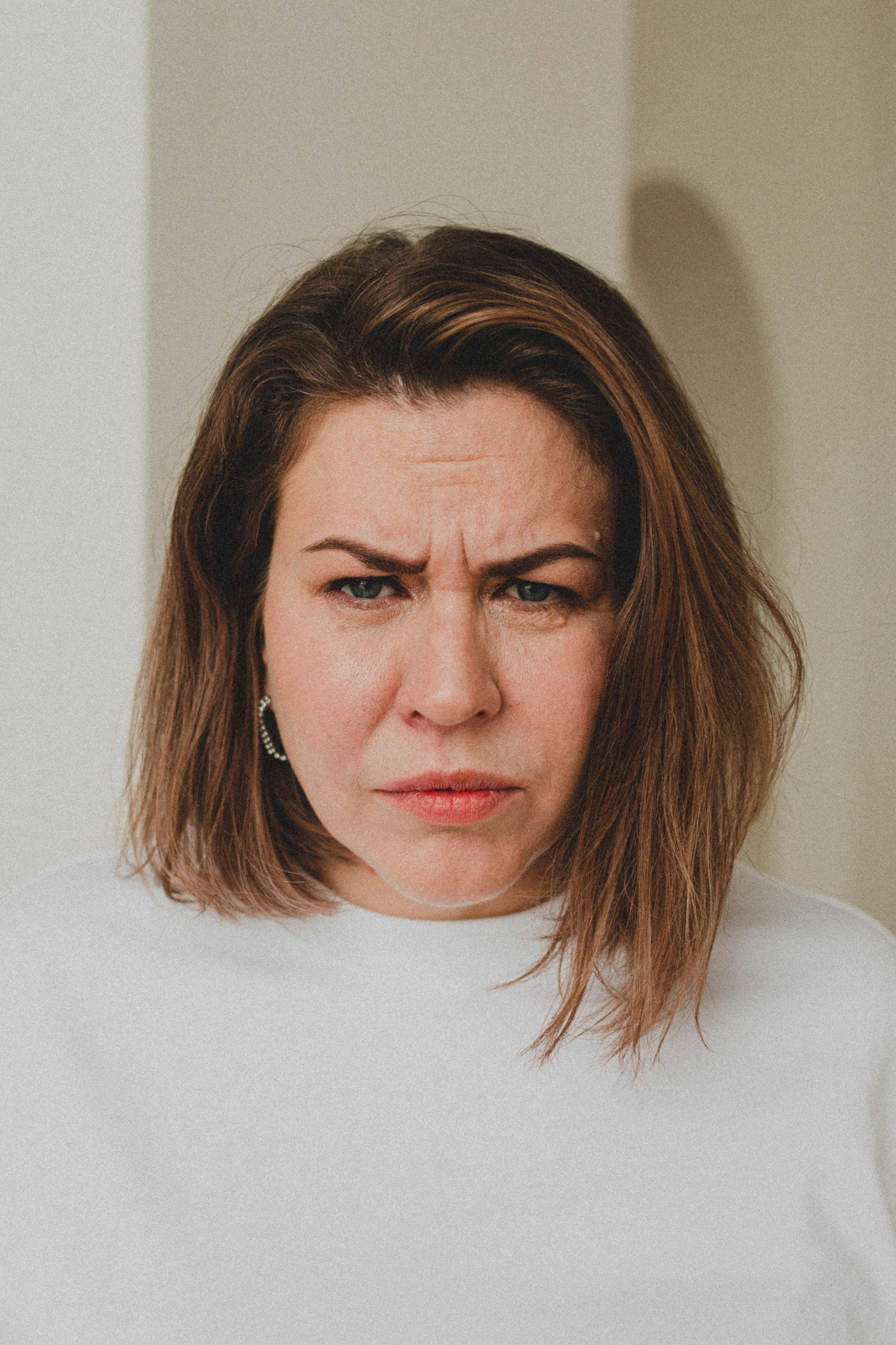 portrait of woman frowning