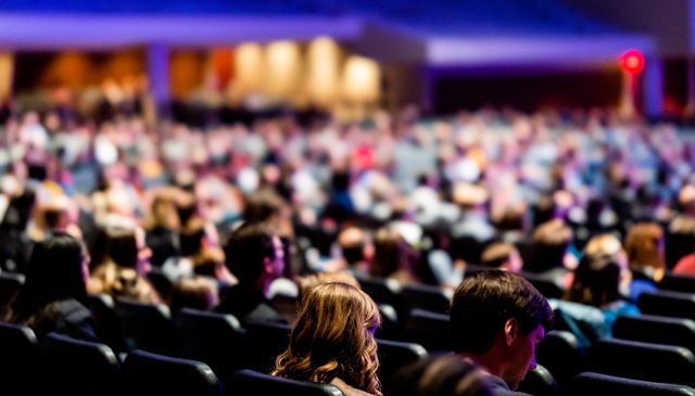 Conference crowd listening to the closing debate