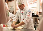 Man in White Chef Uniform Sitting on Chair