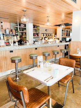 Inviting vintage-style diner with bar stools and wooden decor in Miami, Florida.