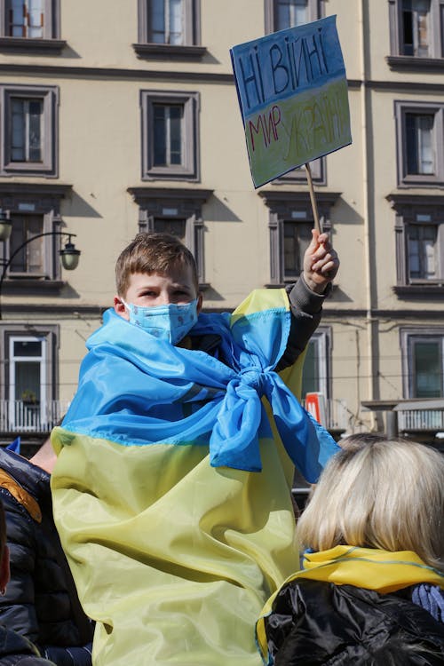 Free Child holding a Protest Placard  Stock Photo