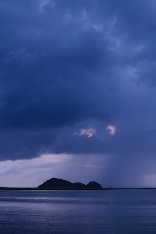 Kostnadsfri bild av hav, havsområde, molnig himmel