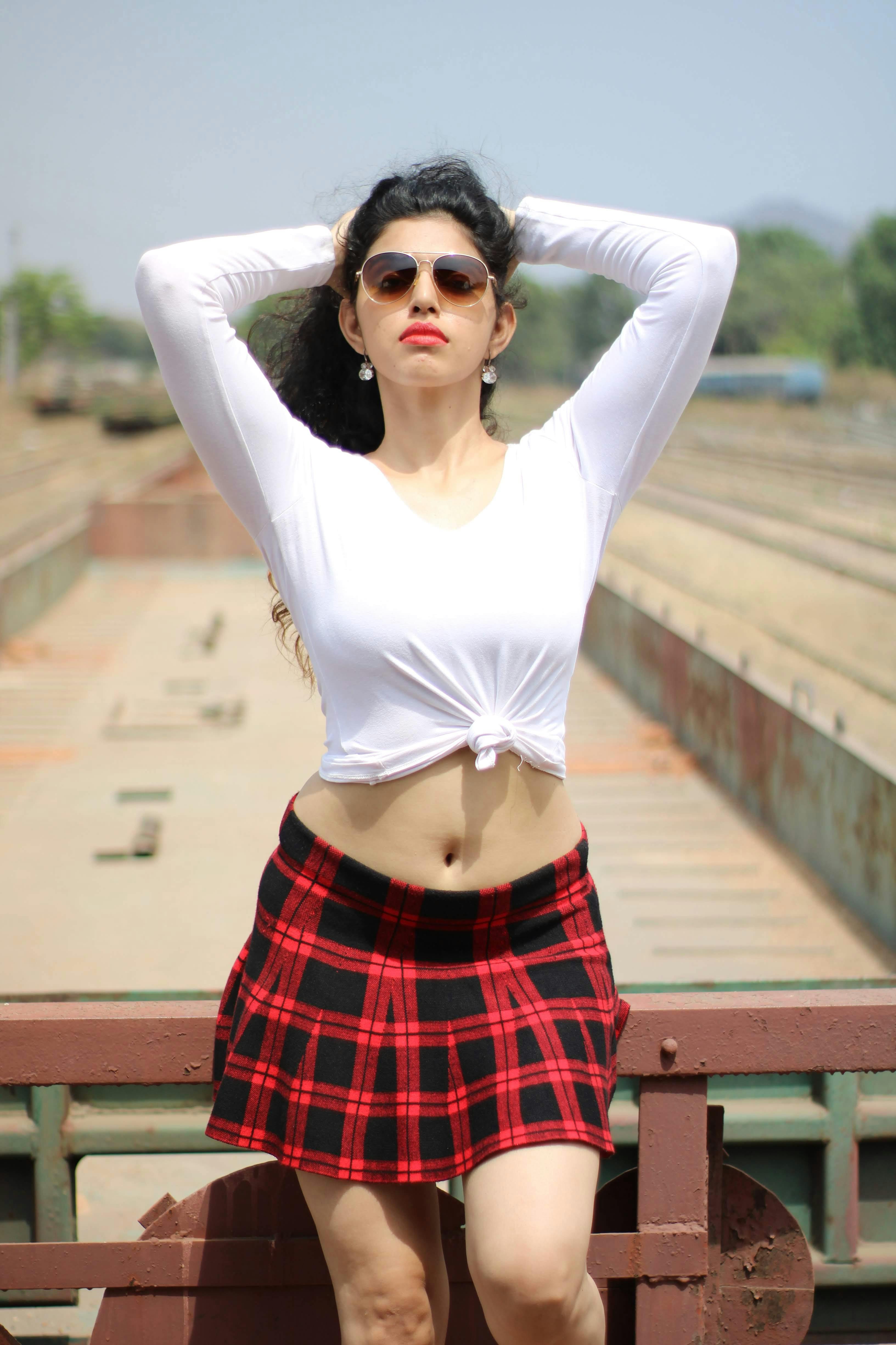 Woman in White Long Sleeve Top Red and Black Plaid Sunglasses · Free Stock Photo