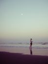A Woman Standing on the Beach