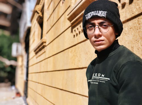 Young Man in Black Knit Cap and Black Sweater 