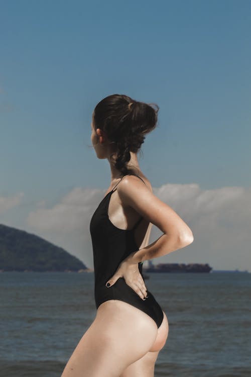 A Woman in Black Swimsuit