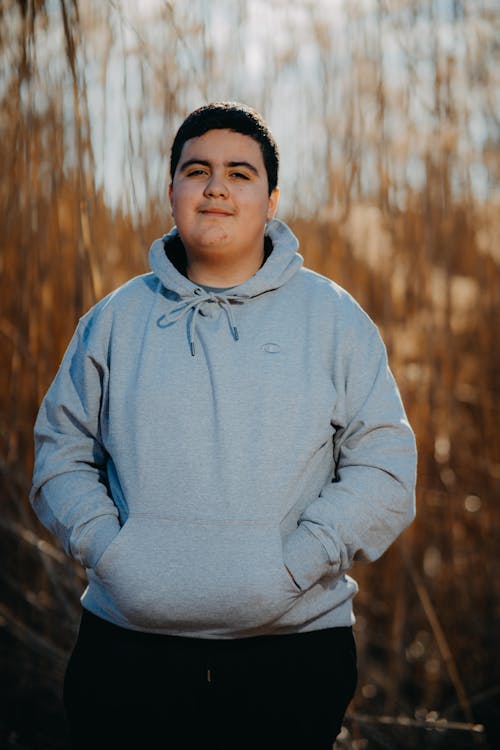 A Man in Gray Hoodie