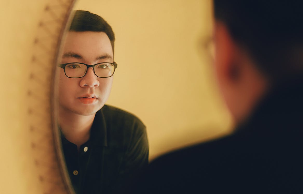 Free Photo of Man Looking at the Mirror Stock Photo