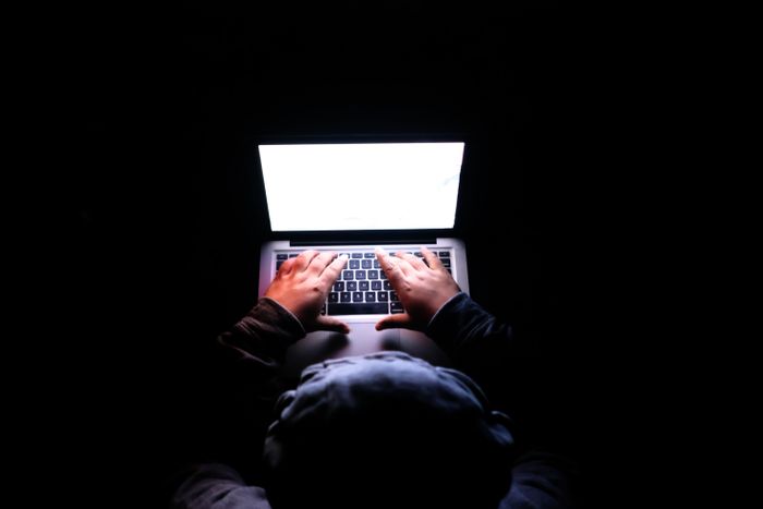 Working late by the light of a laptop — Towfiqu barbhuiya on Pexels
