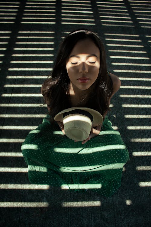 A Woman Sitting on the Floor