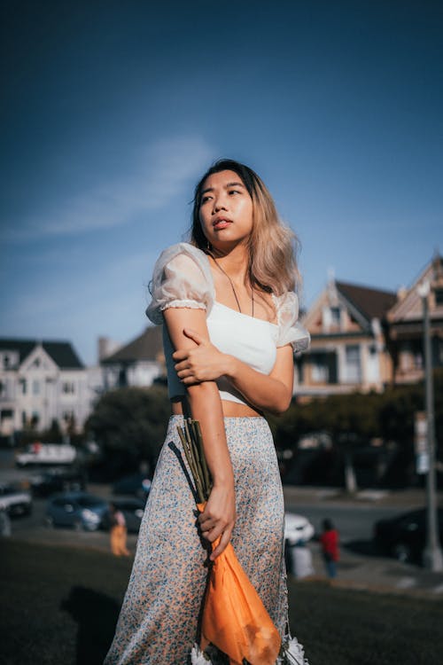 A Woman in White Crop Top