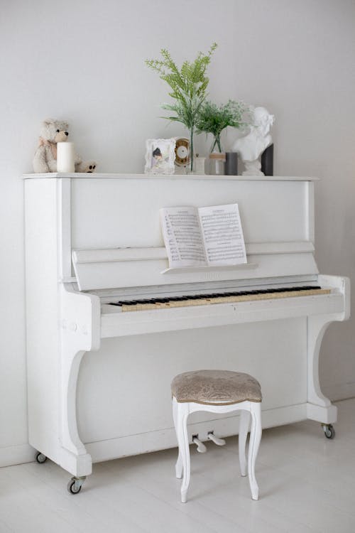 A White Upright Piano